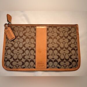 Coach tan clutch 7 3/4 by 4 3/4